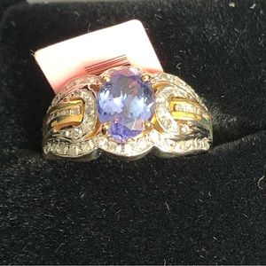 Oval tanzanite with diamond accents gold ring sz 6